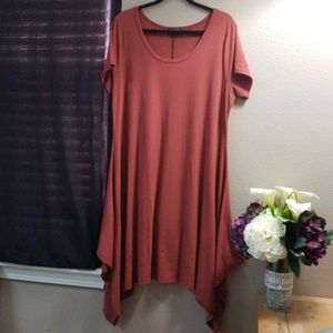 Burnt orange shark bite hem dress